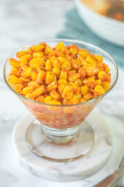 Masala corn served in a bowl.