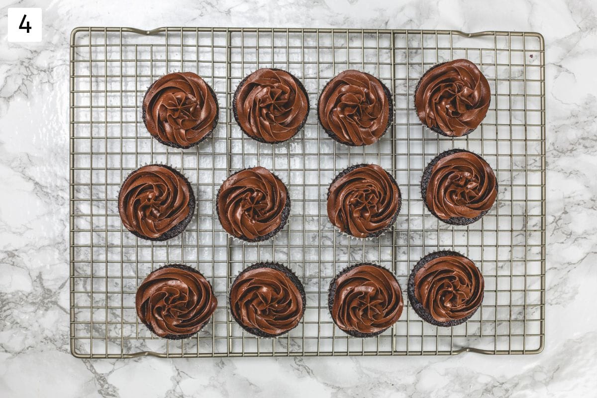 Eggless chocolate cupcakes on a wire rack.