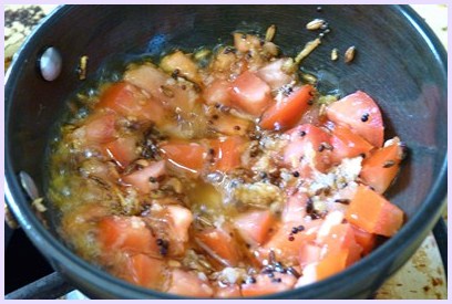 Cooking tomatoes.