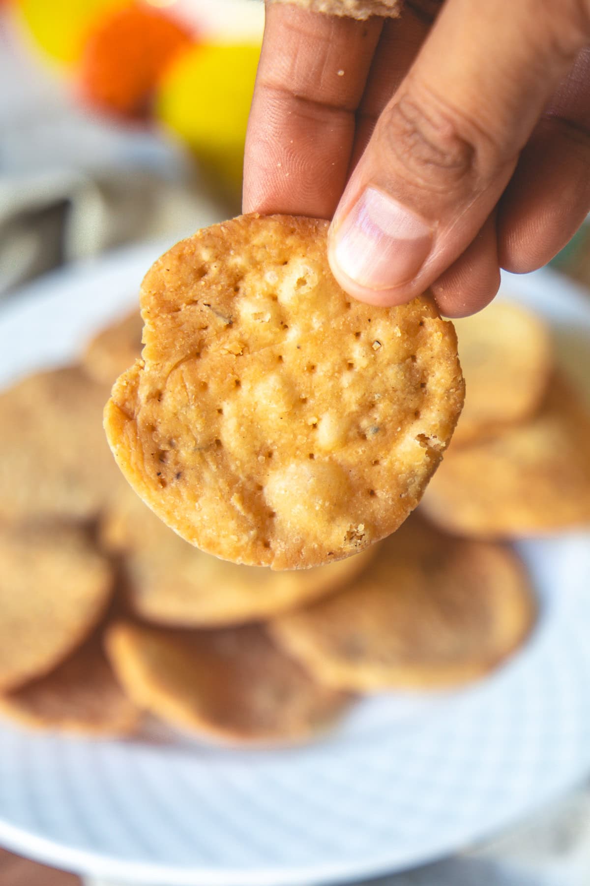 Holding one farsi puri.