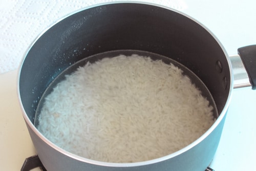 adding water to the rice