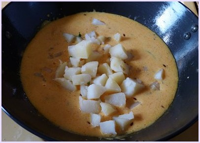 adding boiled potatoes