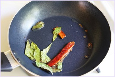 adding curry leaves to the tempering.