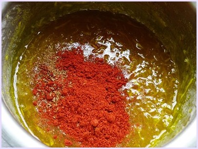 adding red chili powder