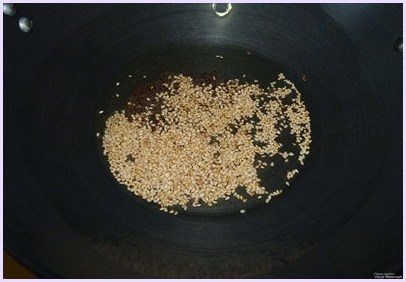 tempering on mustard and sesame seeds