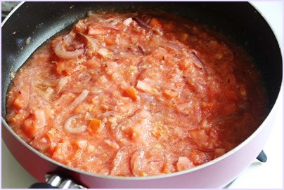 adding chopped tomatoes and pureed tomatoes