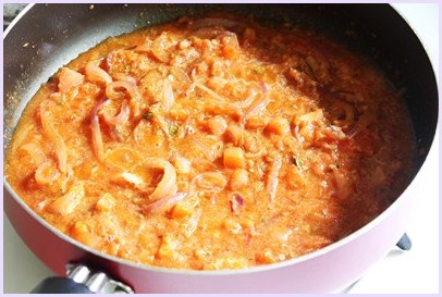 mixing spices into the gravy