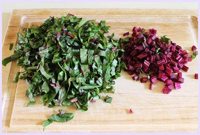 Chopping beetroot leaves