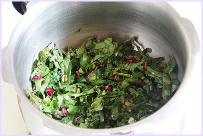 Cooking beet greens and stems.