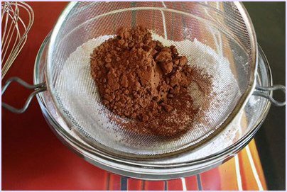 sifting cocoa powder