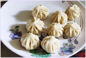 all shaped modaks on a plate