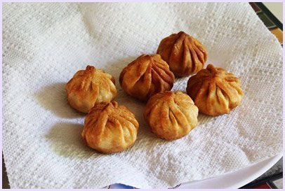 modak on paper towel lined plate