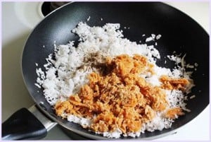 Coconut and jaggery in a pan.