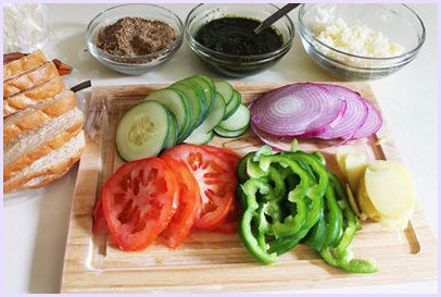 Sandwich elements are ready on the counter.