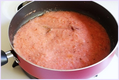 Adding onion tomato paste.