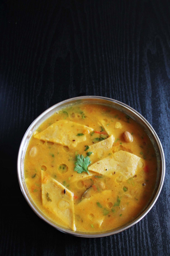 Dal Dhokli garnished with cilantro.