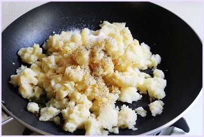 adding boiled, mashed potatoes, salt and pepper