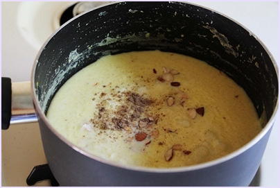 adding cardamom powder to samak kheer