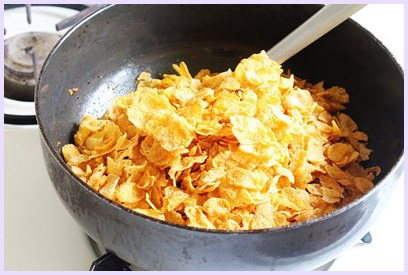 adding corn flakes cereal