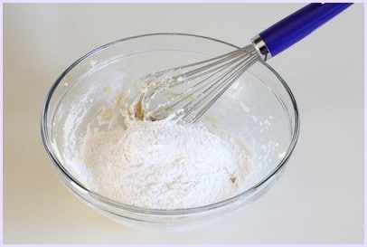 dry ingredients to butter, sugar mixture