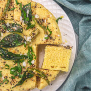 Khaman dhokla in a plate with napkin on the side.