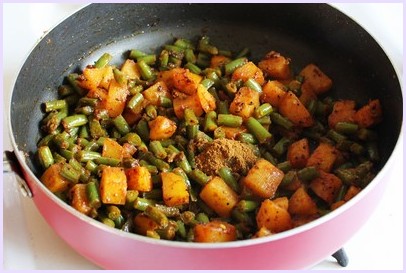 Adding garam masala.