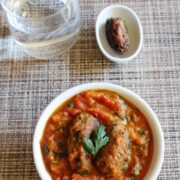 Tameta Muthia Nu Shaak Recipe | Gujarati Tomato muthia curry recipe