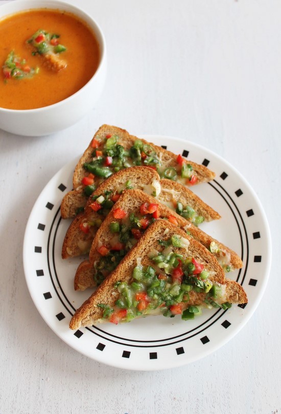 Chilli Cheese Toast triangles served with soup.