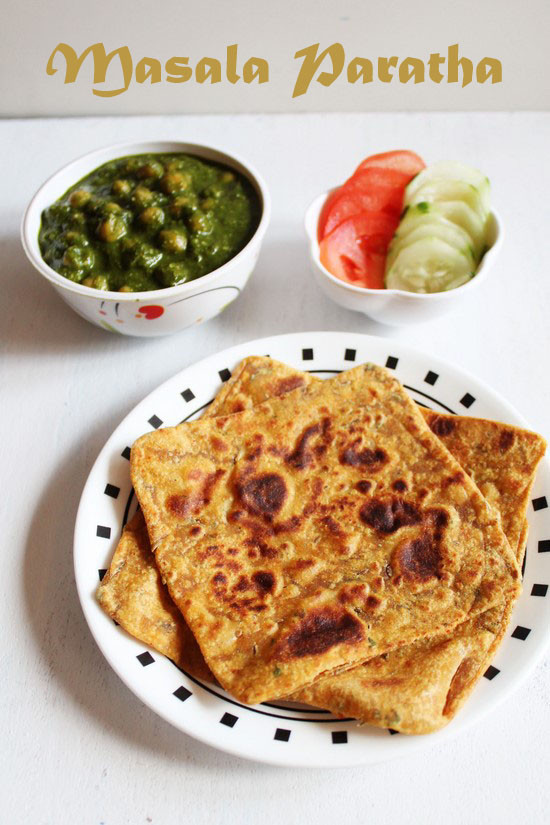 Masala Paratha with chana palak and salad.