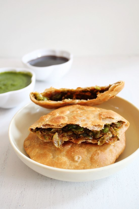 Matar Kachori break open in two to show inside.