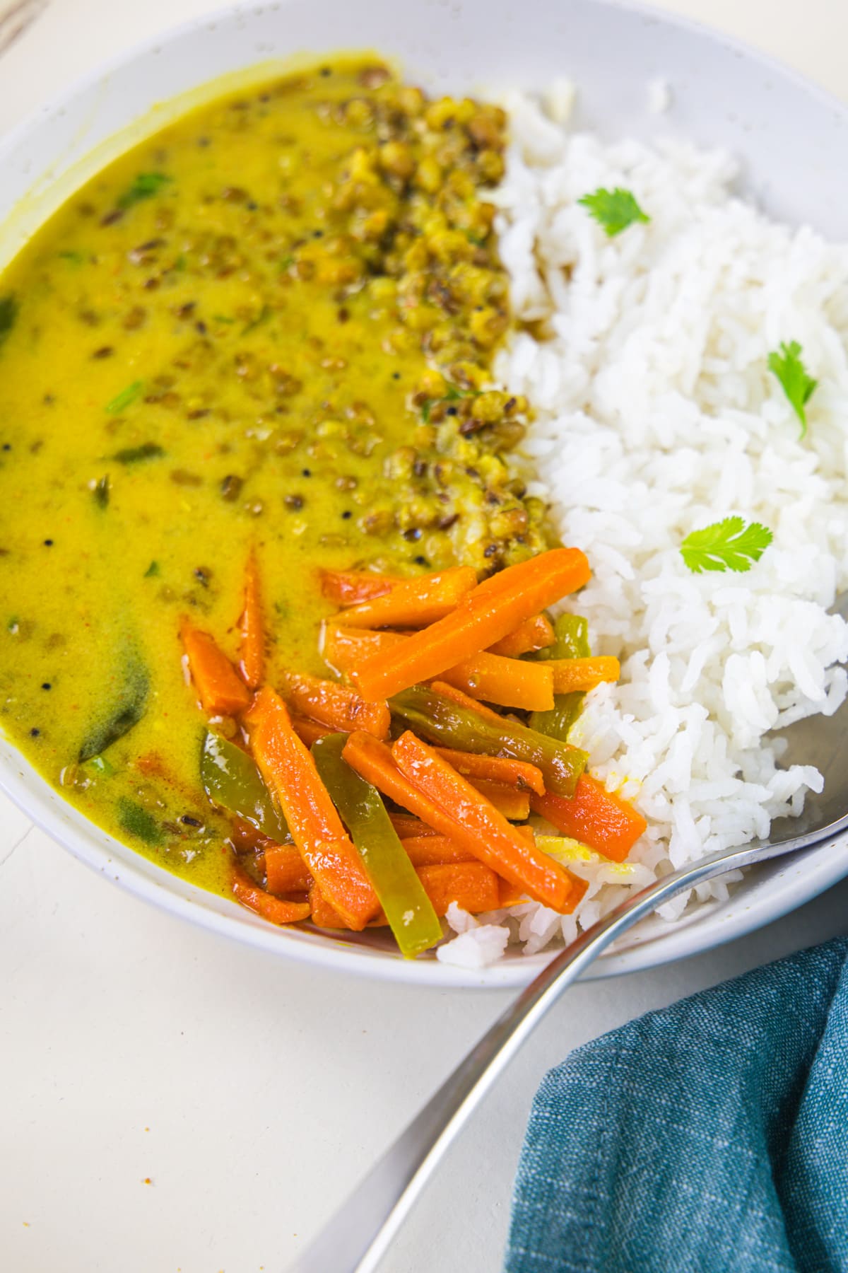 Gajar marcha no sambharo with rice and khatta mag.