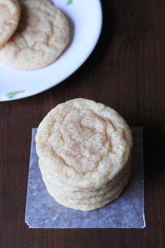 Eggless snickerdoodle cookies on a parchment paper.