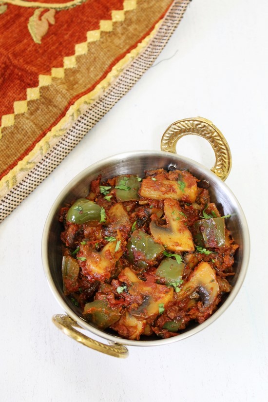 Kadai Mushroom in a serving kadai.