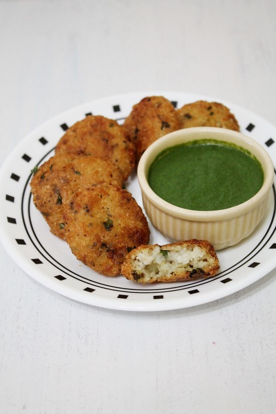 A bite taken from sama ki tikki served with phalahari chutney.