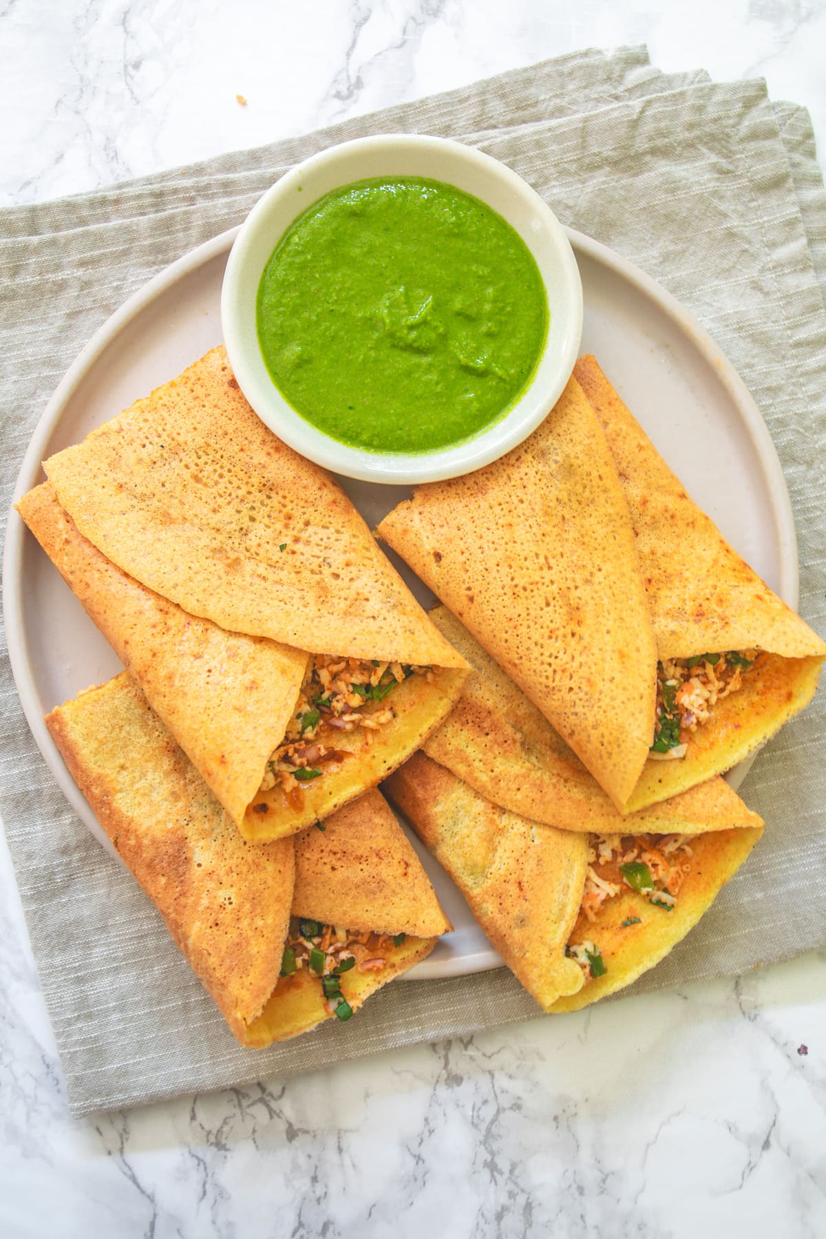 Paneer besan chilla with green chutney.