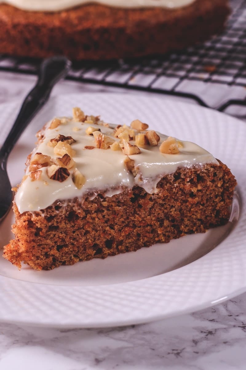 a slice of eggfree carrot cake in a plate