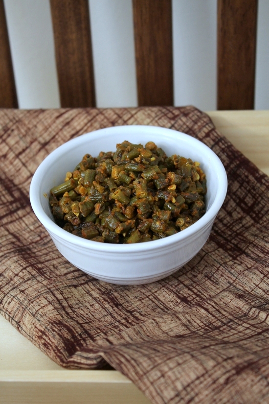 Long beans sabzi in a bowl with napkin under it.