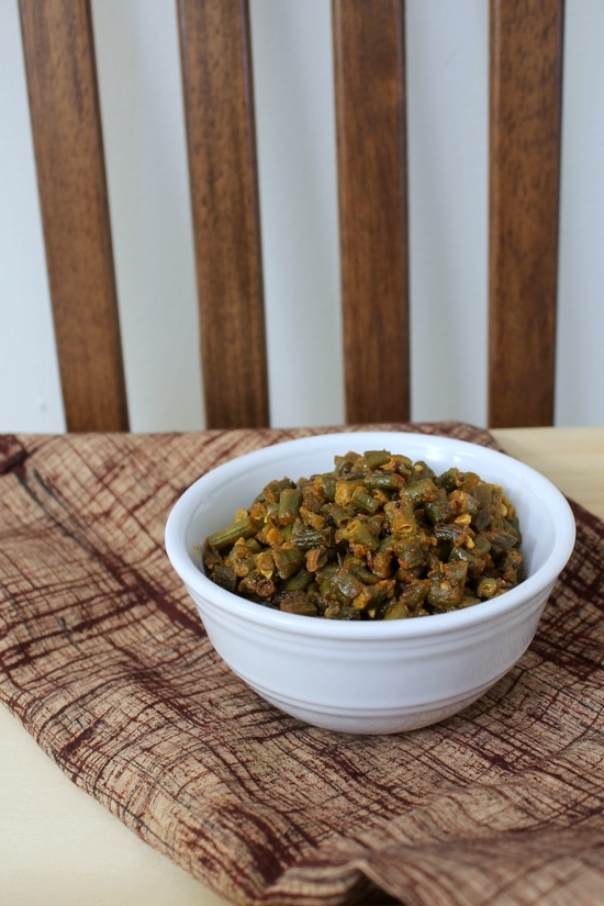 Long beans sabzi in a white bowl.