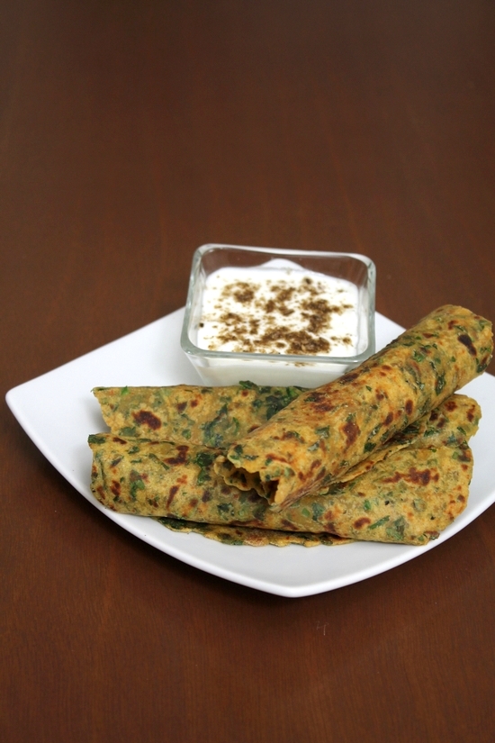 Methi paratha recipe with step by step photos - This is healthy and simple (not stuffed) paratha recipe for breakfast or light meal. This is Indian flatbread where boiled, mashed potatoes are added into the dough which makes it soft and melts in your mouth texture. Serve a bowl of yogurt or pickle as a side dish and make it a healthy, filling breakfast, brunch or meal. #breakfast #indianfood #flatbread