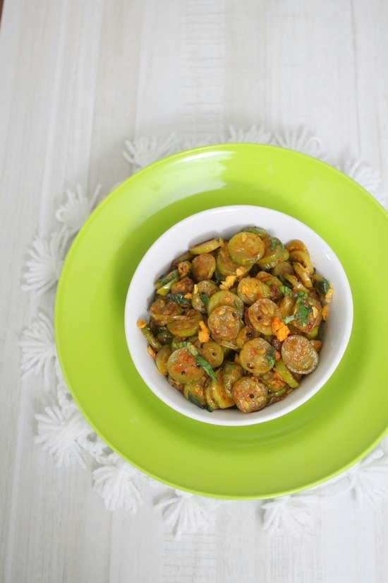 Tondli chi bhaji served in a white bowl.