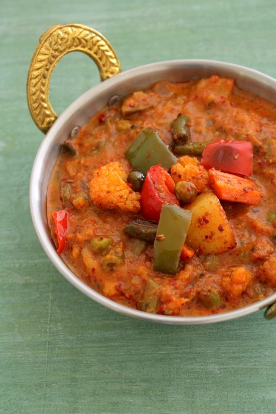 Kadai vegetable served in a serving kadai.