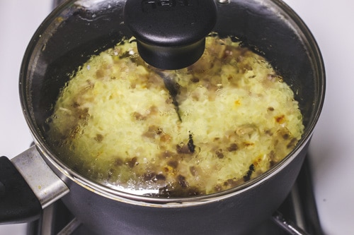 paneer pulao is cooking covered