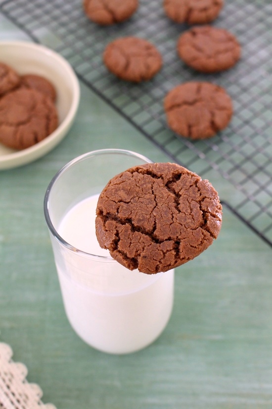 Eggless nutella cookie on a glass of milk.