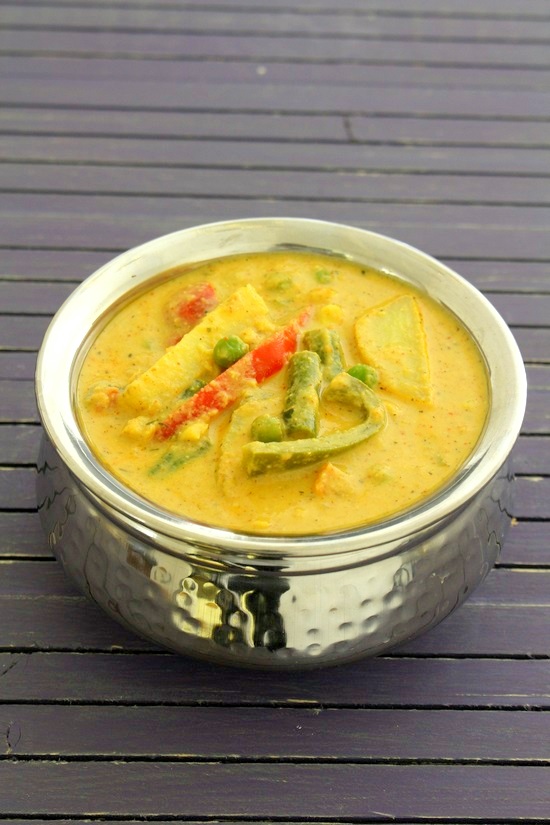 Veg handi served in a steel serving handi.