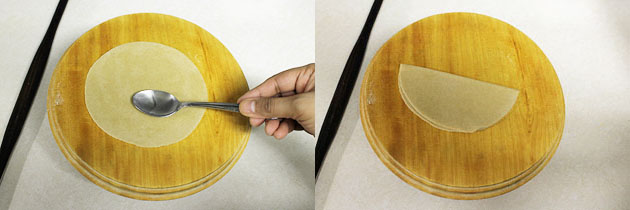fold rolled paratha into half moon.