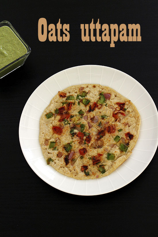 Oats uttapam in a plate with a bowl of chutney in the back.