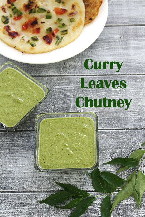 2 bowls of curry leaves chutney with a sprig on curry leaves on the side.