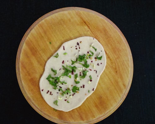 sprinkle of garlic, cilantro and chilli flakes