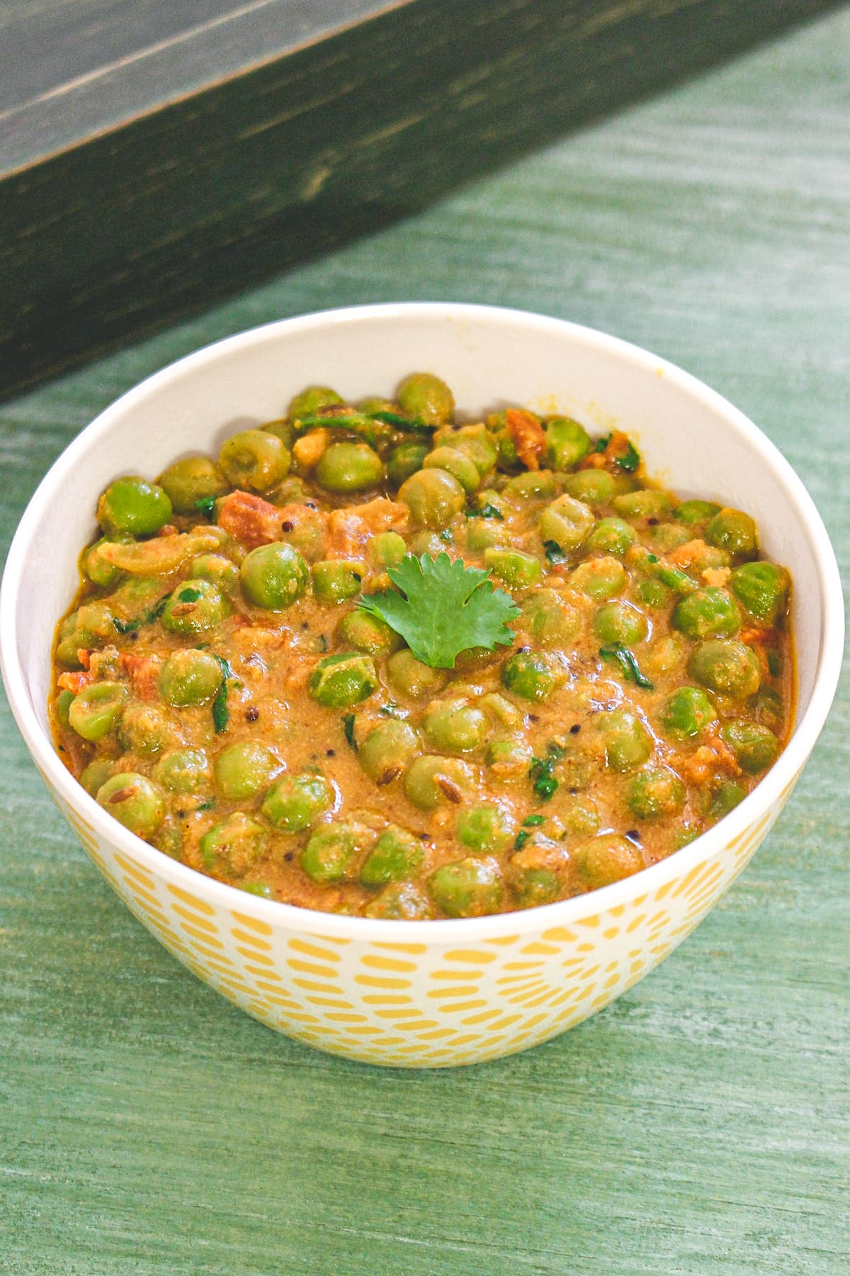 Matar ki sabzi in a bowl.