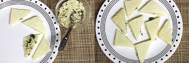 stuffing the triangles with grated paneer mixture